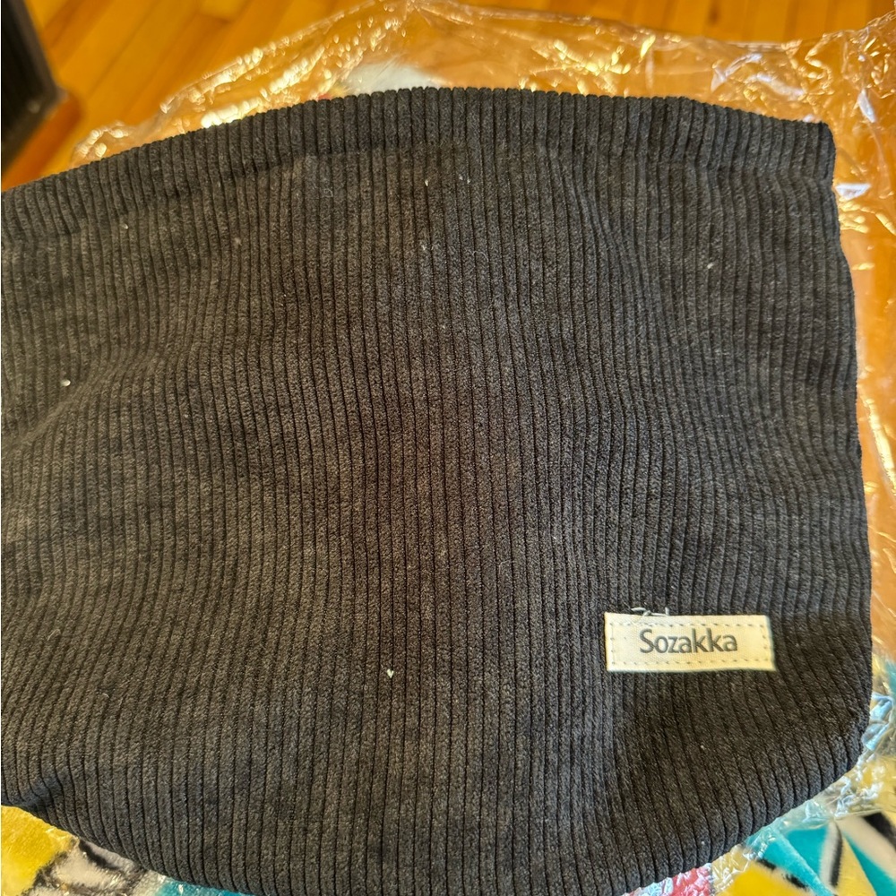 New in bag corduroy zipper top cosmetic bag. Beautiful bag
